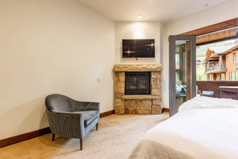 Enjoy the privacy of the primary suite with the private balcony and hot tub.