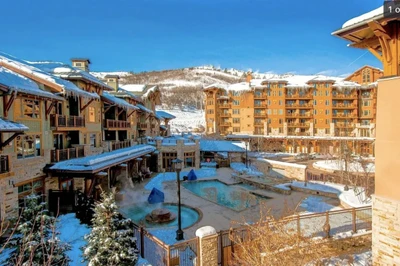 Beautiful views of the Mountains, Hyatt and the hot tub and pools that guests have access to during their stay.