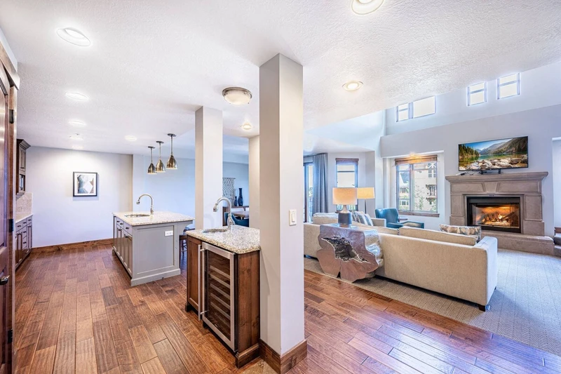 Boasting a spacious open floor plan that flows seamlessly from gourmet kitchen