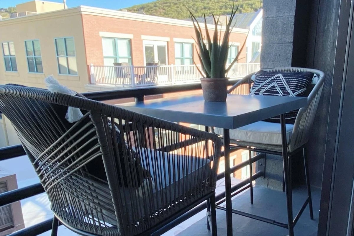 Enjoy a cup of coffee while looking down on Main