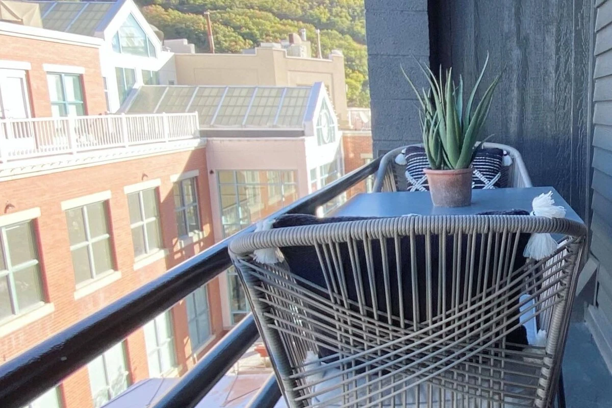 Enjoy a cup of coffee while looking down on Main