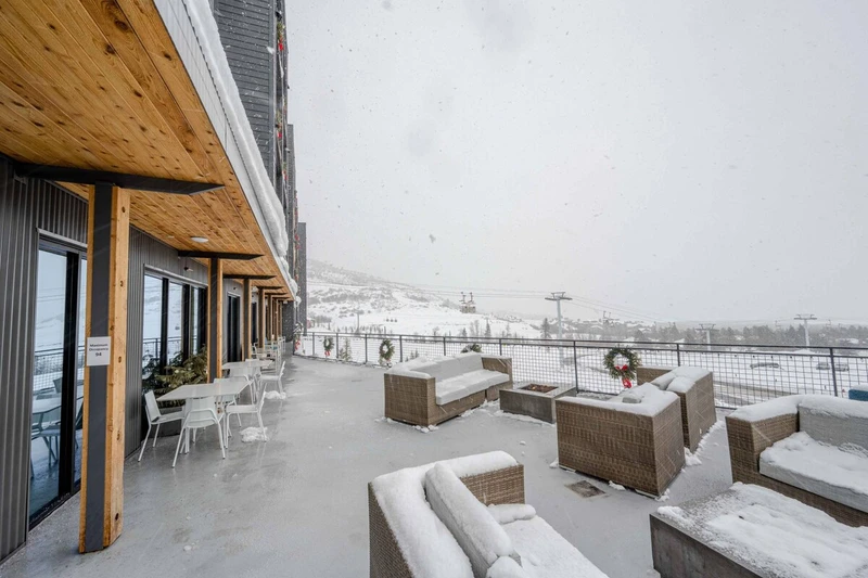Take in the views of the Cabriolet lift while lounging on the modern furniture and stay cozy with the large fire pits