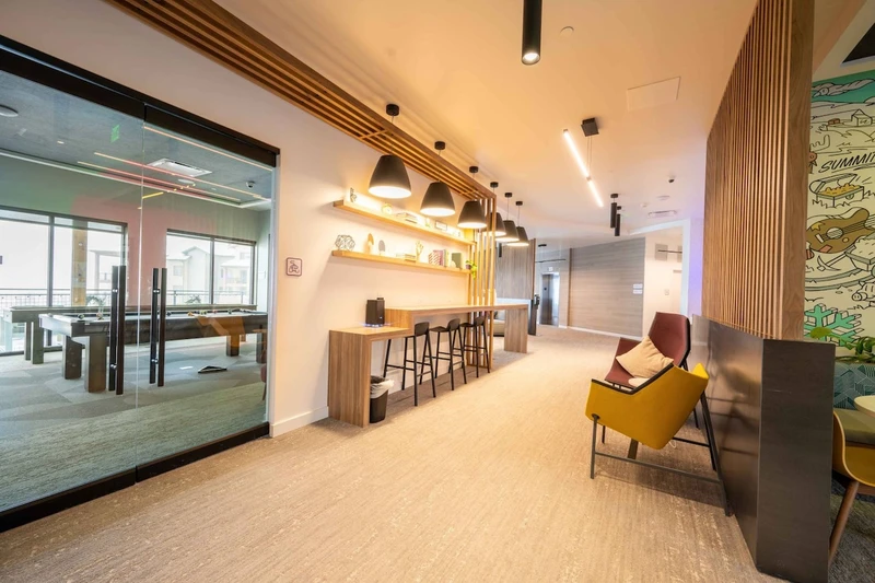 Savor a cup of coffee at the coffee bar in the modern lobby just steps from the home