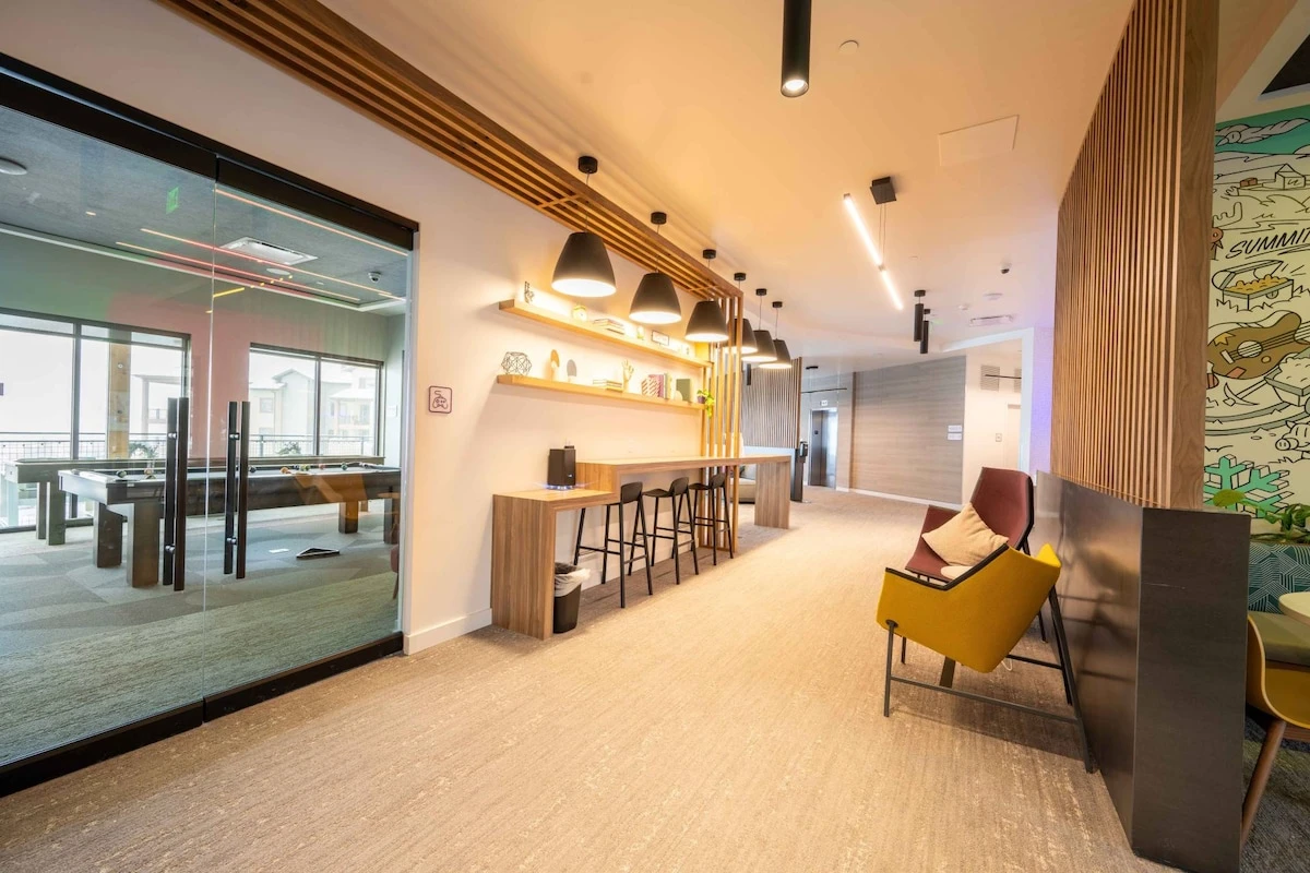 Savor a cup of coffee at the coffee bar in the modern lobby just steps from the home