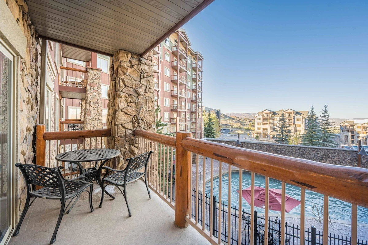 Outdoor pool and partial mountain view from the Balcony