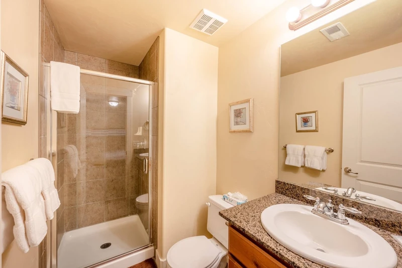 First Bathroom with walk-in glass shower