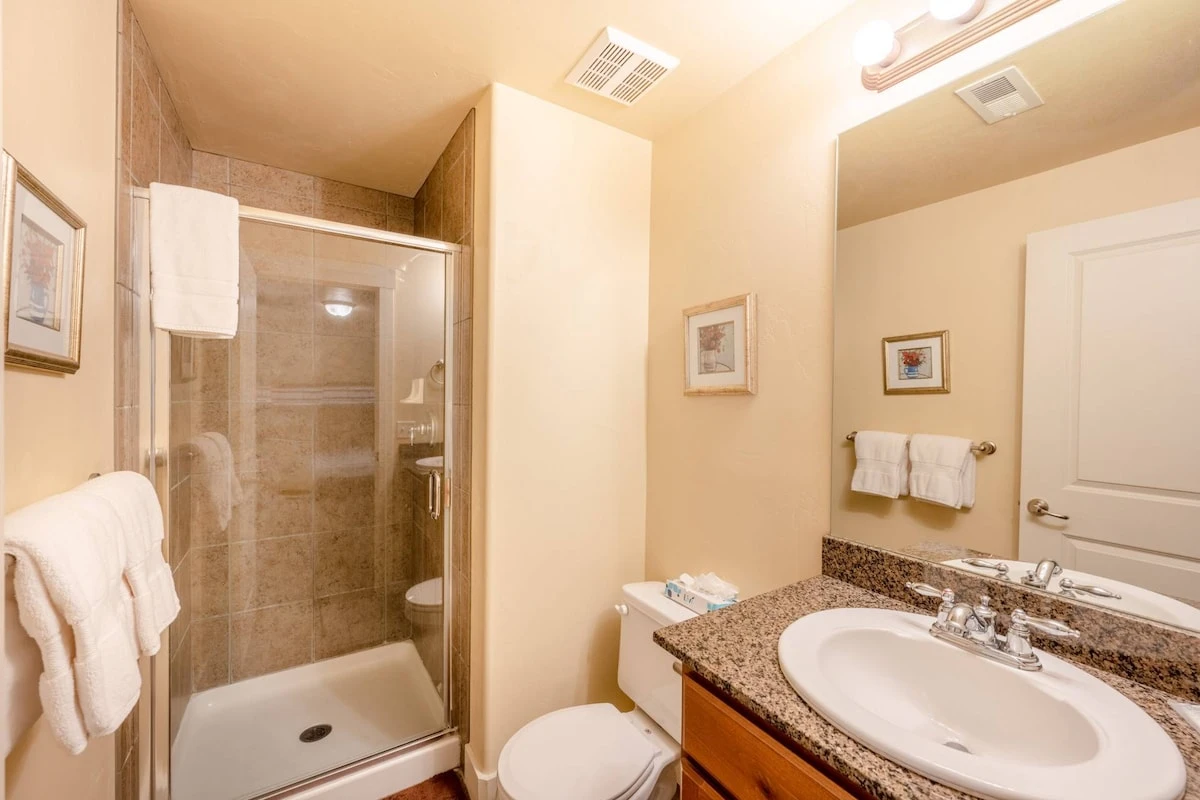First Bathroom with walk-in glass shower