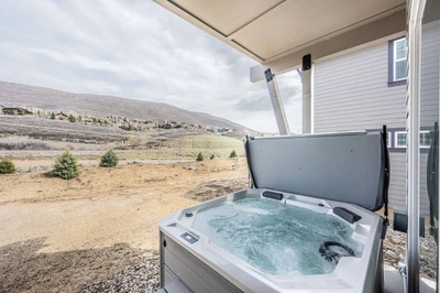 Brand new 6 person private hot tub on your back porch with views of the mountains