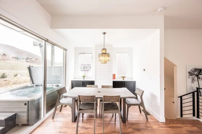 The gorgeous open-plan living and dining area giving you ample space to entertain in utter style while enjoying the views