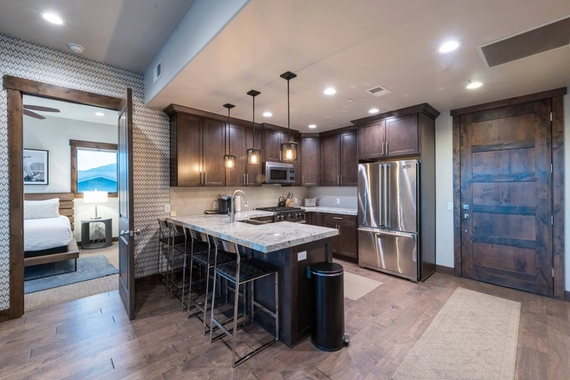 The Open Floor Plan Welcomes Guests to Relax and Enjoy Seamless Transitions from Room To Room, Cozy Fireplace, Smart HDTV and Panoramic Views!