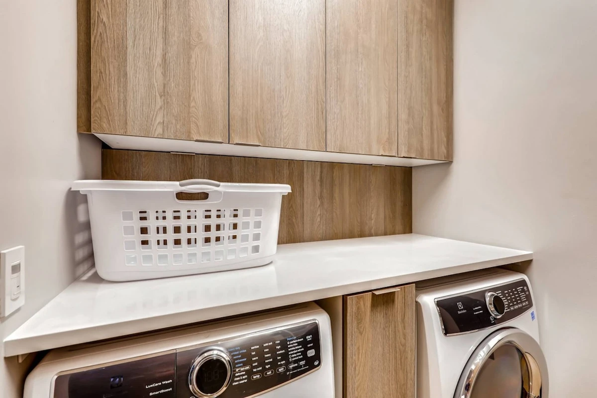 In-unit laundry room with full-size washer and dryer—convenient for extended ski stays and multi-family trips.