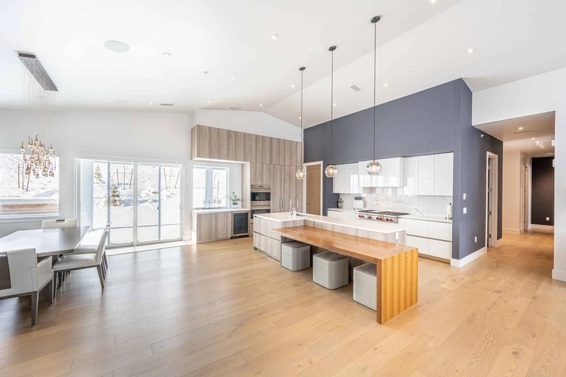 The thoughtful, open concept floor plan brings the beauty of the natural surroundings while blending modern architecture