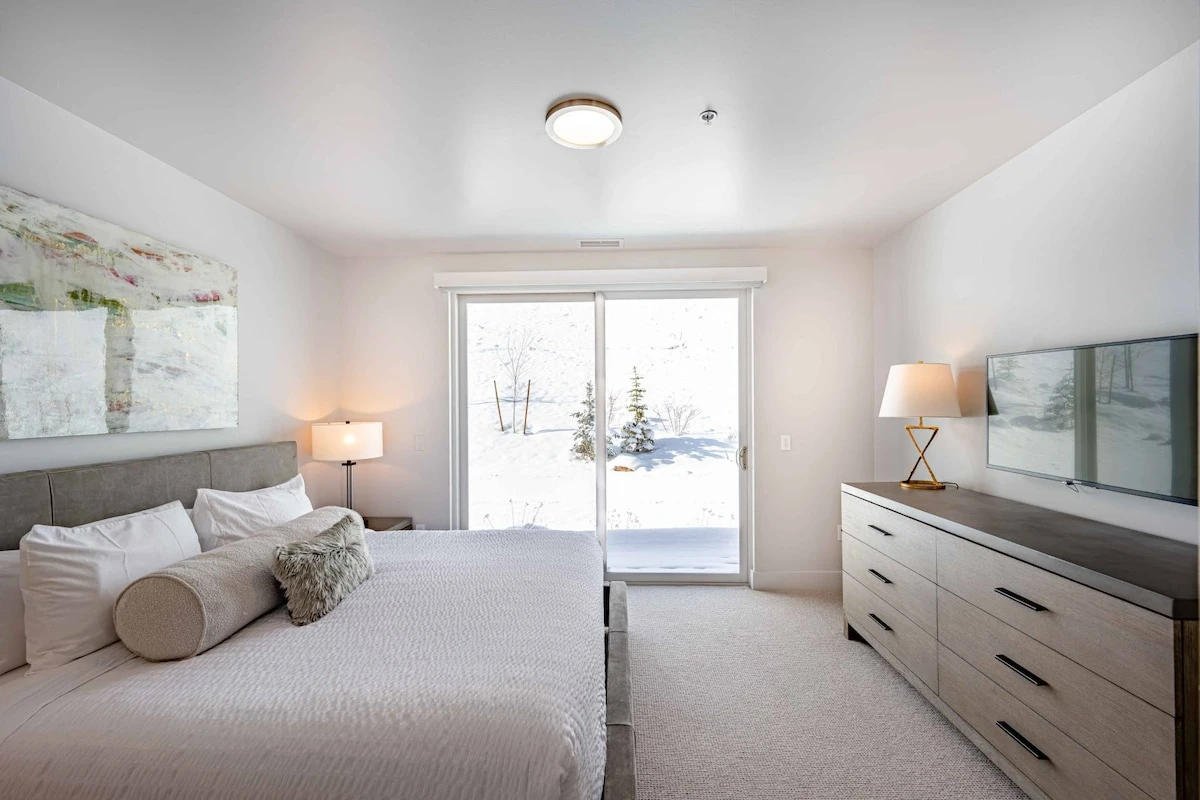 The first guest suite is located next to the entry and features a King size bed with high quality linens, smart HDTV and a spacious dresser for storag