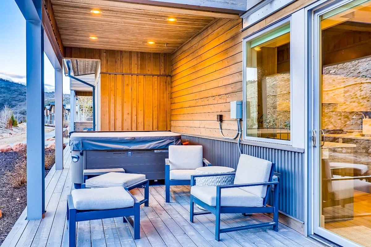 Nestled into the mountainside, the back deck is a great spot for taking in the sweeping views, you can relax in your private Hot Tub or enjoy your fav