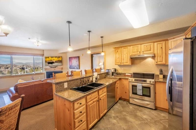 Enjoy Mountain Views from Our Bright & Spacious Updated Kitchen! The Fully Stocked Kitchen Features Full Size Stainless Steel Appliances as Well As Sm