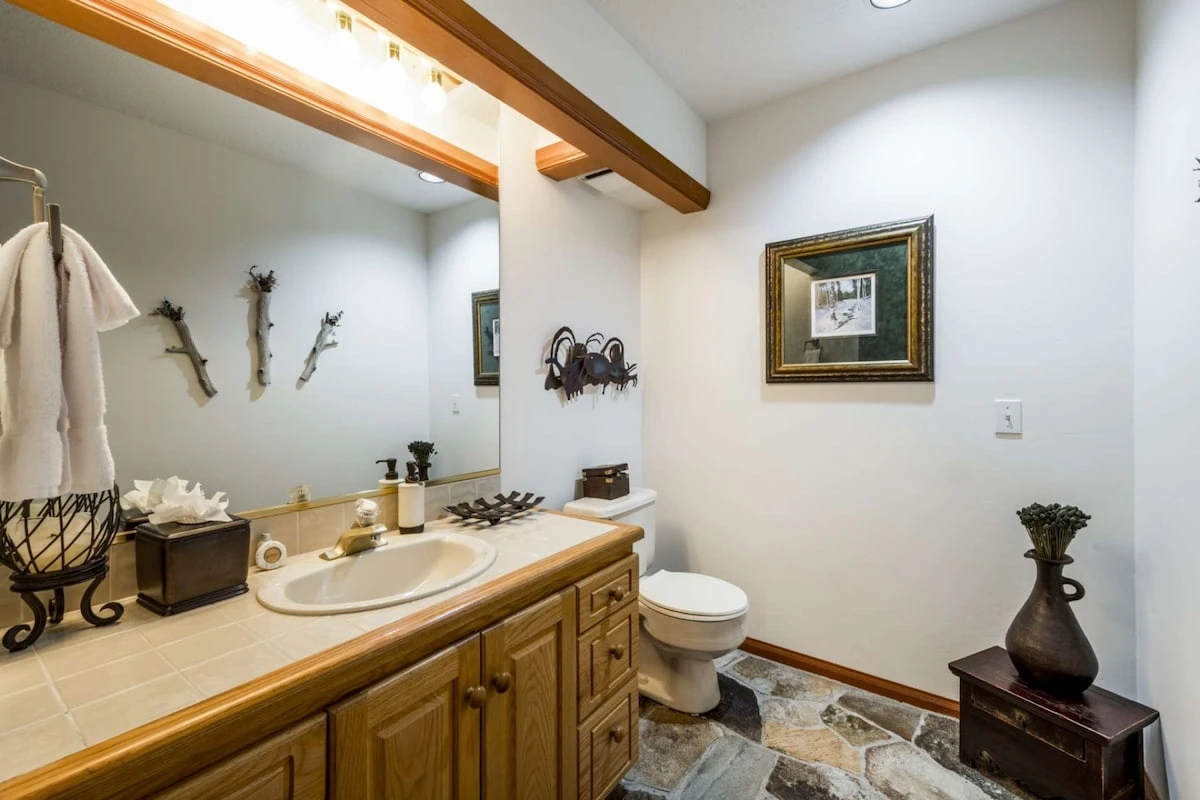 Just off the kitchen on the main floor guests have the convince of a half bathroom