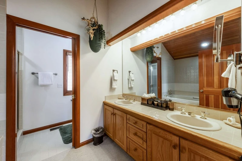 Master Bedroom En Suite Bathroom with Twin Vanities, Oversized Jetted Tub, Separate  Toilet and Glass Shower