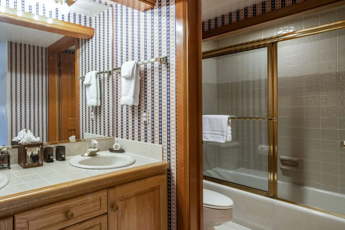 Guest En Suite Bathroom Offers Twin Vanities, Separate Toilet/Bath/Shower Area