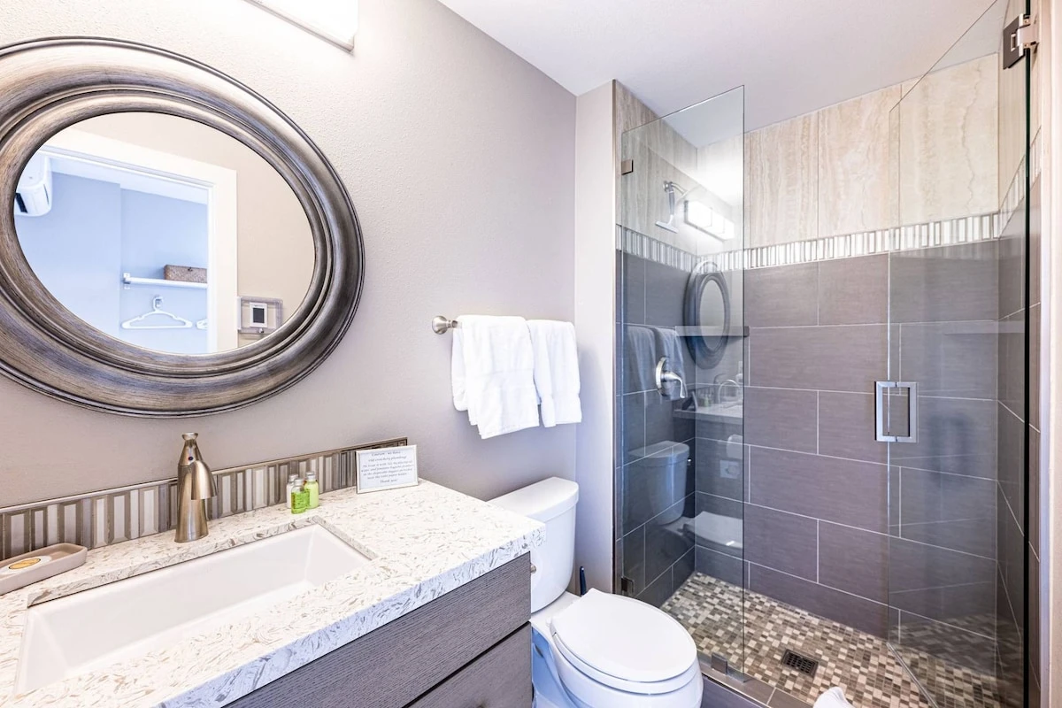 Guest Bathroom with Marble Vanity, Walk-In Glass Shower