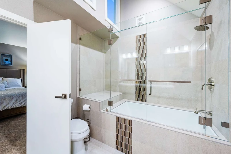 Elegant Master Bathroom - Dual Vanities, Oversized Glass Shower and Tub, Vaulted Ceilings