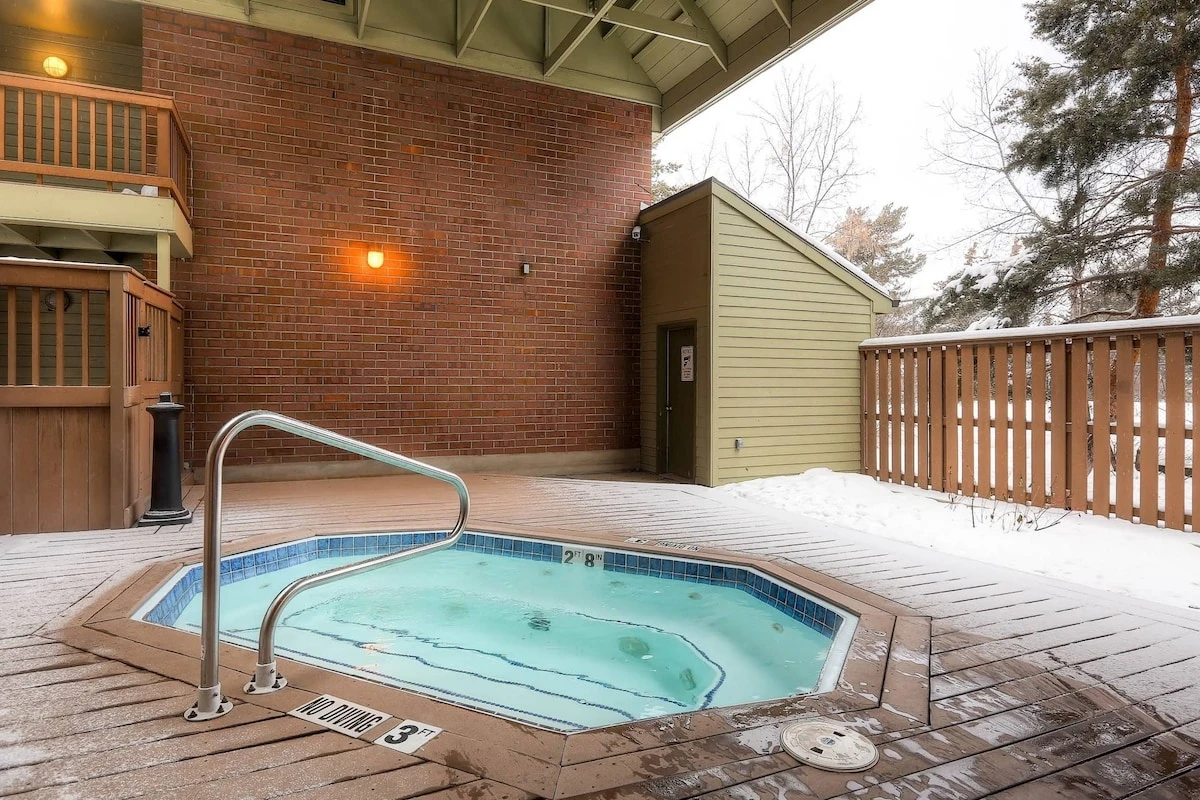 The communal hot tub is outdoors - making it beautiful year round- but it is also conveniently covered.