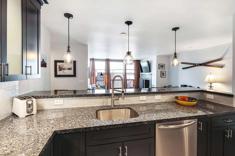 Open Floor Plan w Breakfast Bar Overlooking Family Room, Upgraded Appliances, Hardwood Floors, Granite Countertops, Stainless Steel Appliances