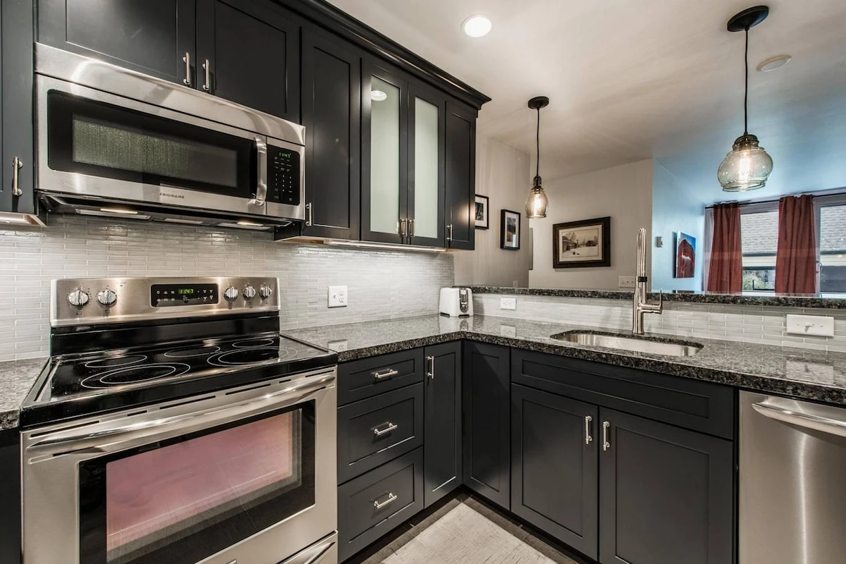 Like the rest of the home, the kitchen has been fully renovated with new cabinetry, flooring, countertops and appliances to create the chef’s kitchen.