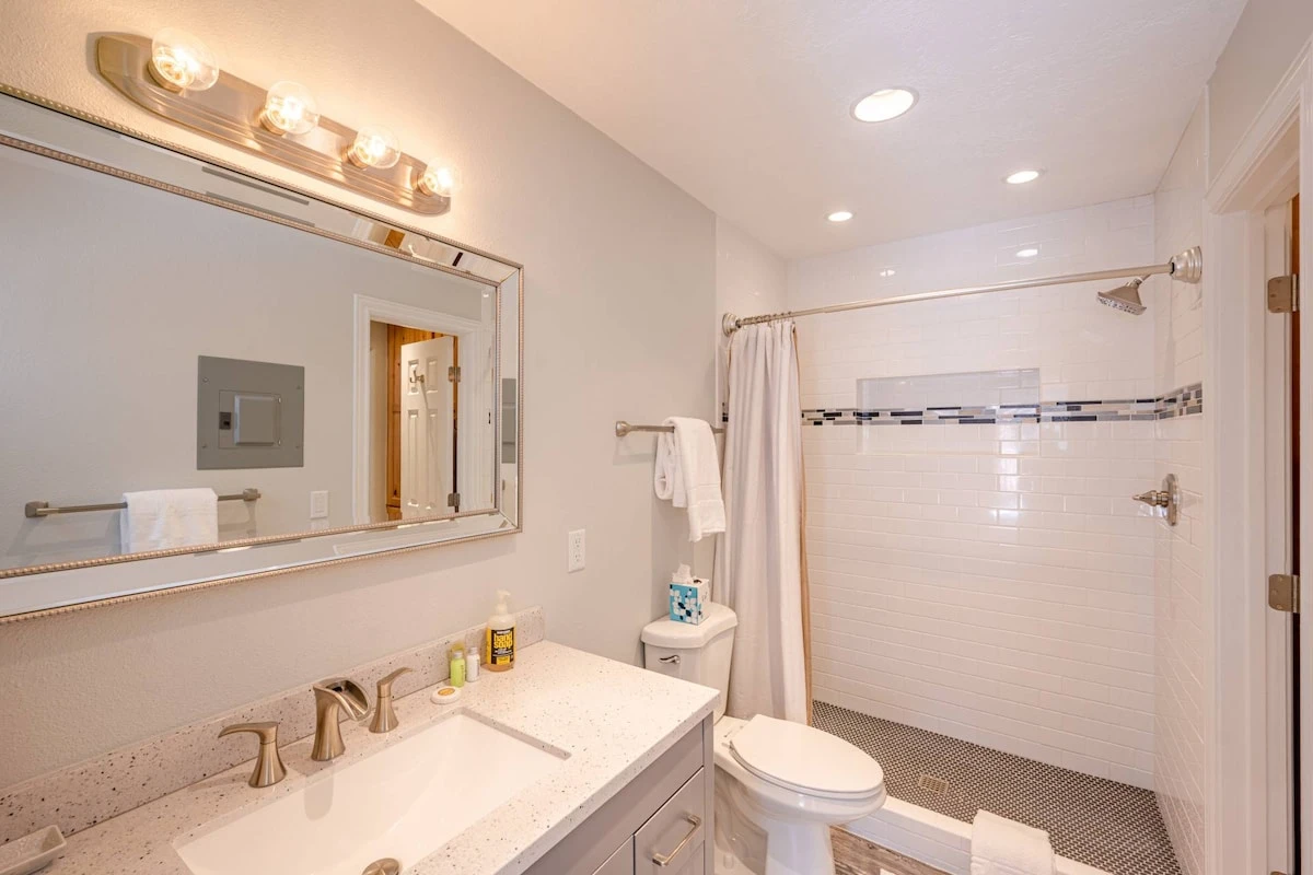 Recently Renovated Bright & Spacious Bathroom with New Walk-In, Custom Tile Shower with a Rainfall Shower Head, Granite Counter Top, Beautiful Designe