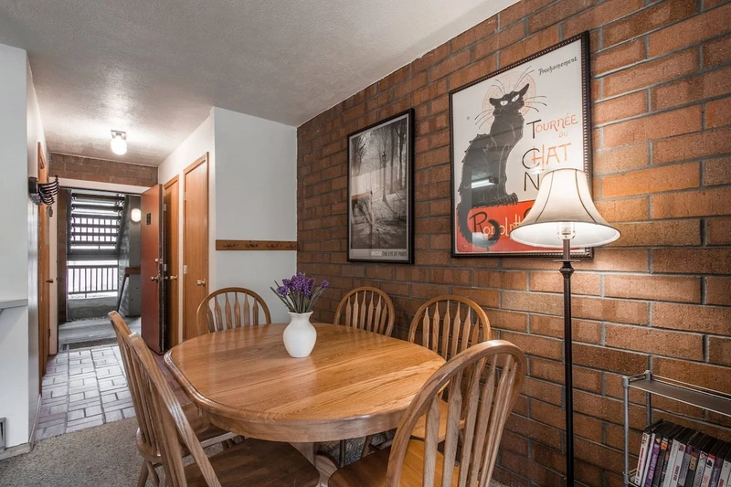 The dining room is located just off of the kitchen and can accommodate six (6) people.