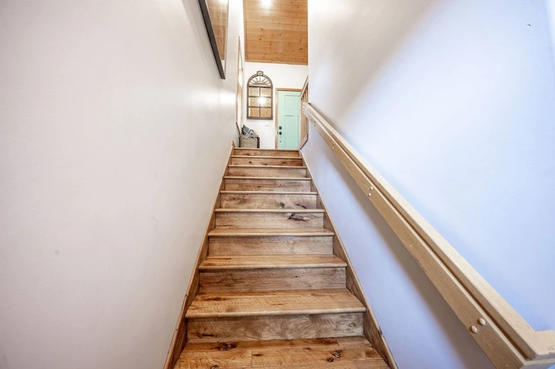 Multi-level layout with stairs connecting living and sleeping areas