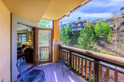 Sundial B414 has direct access from the living room to the outdoor patio/deck, enhancing indoor-outdoor flow.
