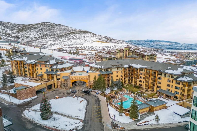 Aerial view of Sundial Lodge at Canyons Village with ski-in/ski-out access, lifts, and walkable dining at Canyons Village, Park City Mountain.