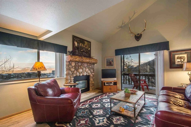 Welcome to Red Pine Winter Way! It features a spacious great room with a river rock decor fireplace, flatscreen TV and comfortable new furnishings.