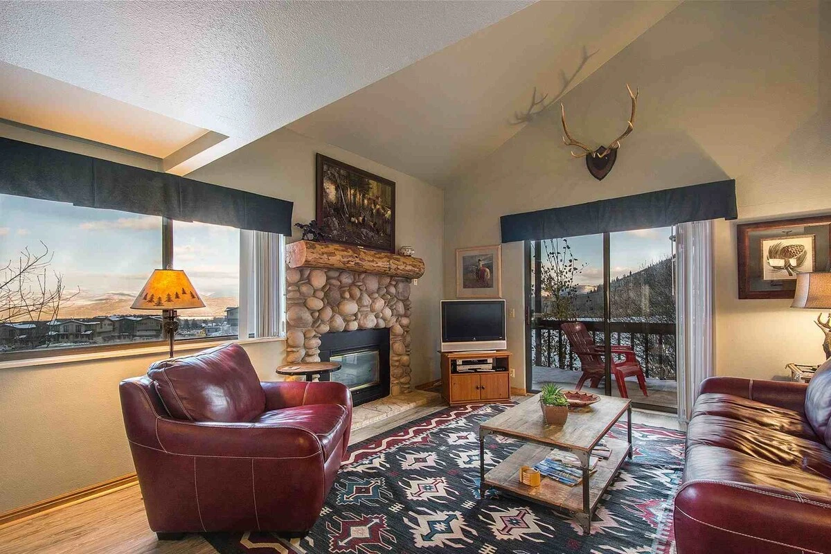 Welcome to Red Pine Winter Way! It features a spacious great room with a river rock decor fireplace, flatscreen TV and comfortable new furnishings.