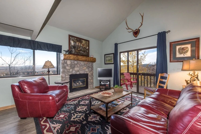 The living room is open and bright with its new furnishings & fixtures, new flat screen HDTV, large windows & private balcony.