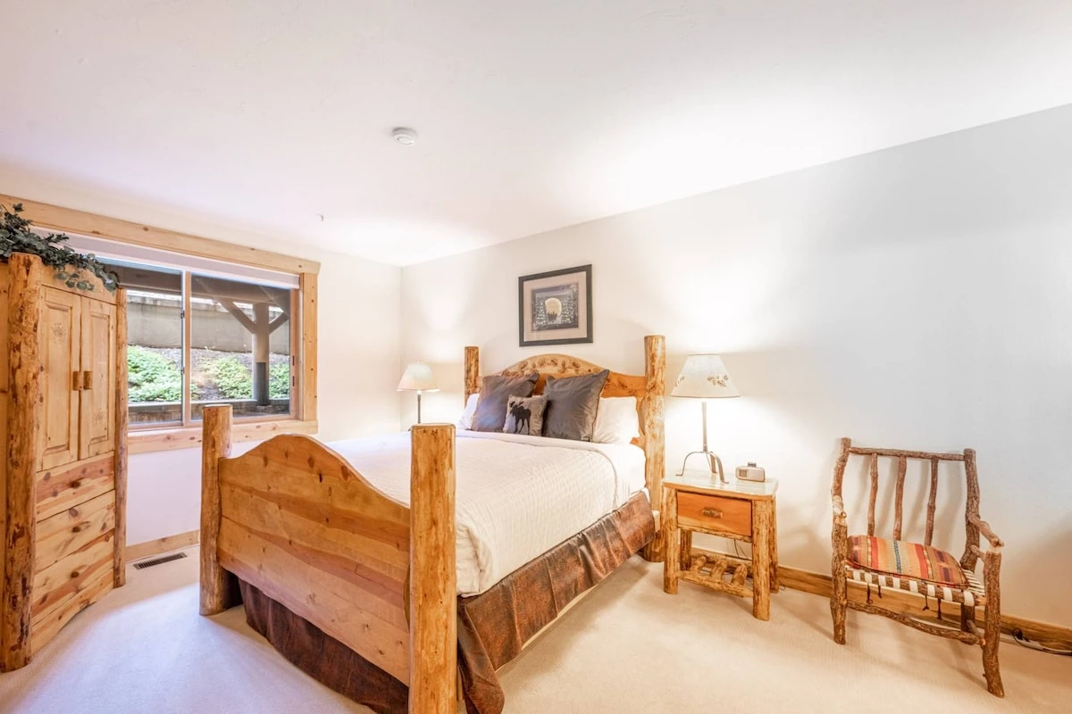 Warm and inviting guest suite with King bed, HDTV and en suite bathroom.