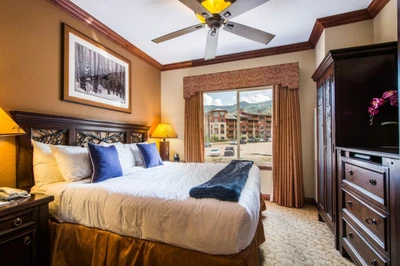 Guest bedroom (2) features a king size bed, high end linens/bedding, dresser, HDTV and private bathroom.