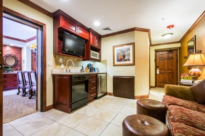Living suite (2) with gourmet kitchenette, comfortable living area with HDTV and large bedroom suite.