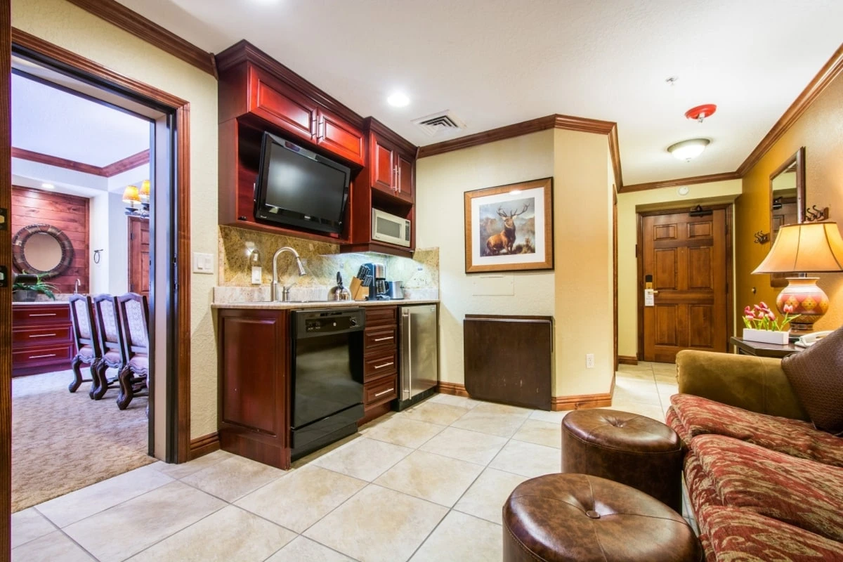Living suite (2) with gourmet kitchenette, comfortable living area with HDTV and large bedroom suite.