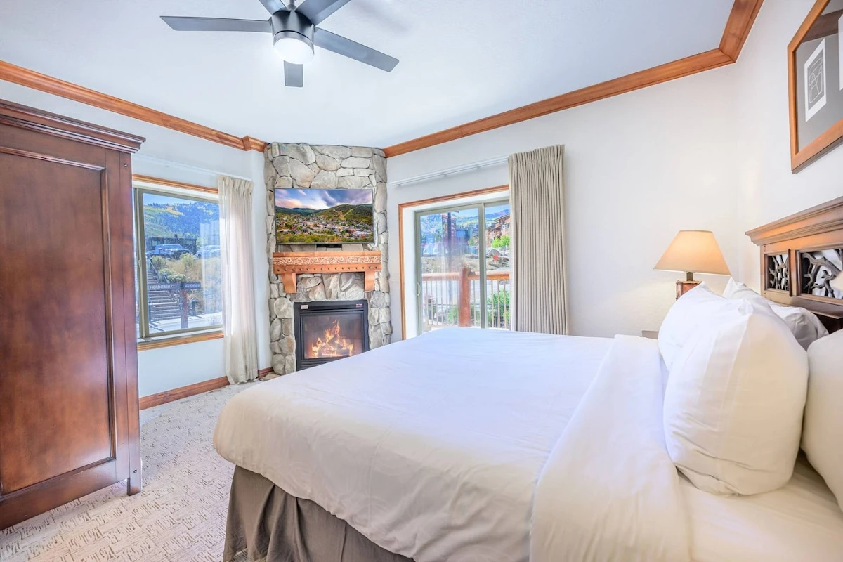 Westgate guest suite with king bed, private fireplace, private patio, HDTV and En Suite Bathroom