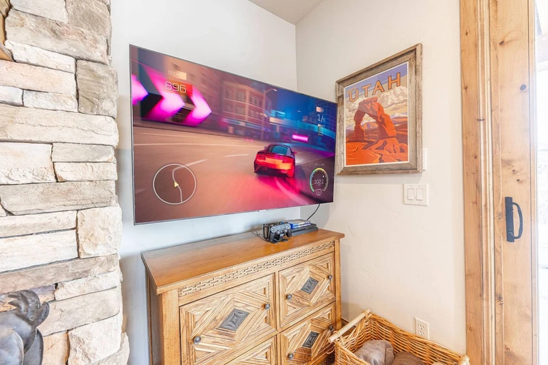 Something fun for Everyone! The Downstairs Family Room has a Playstation 4 with Family Friendly Games