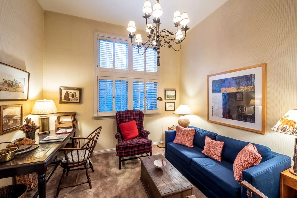 Main Floor Den Offers Privacy For Guests -There Are Doors & The Sofa is a Queen Sleeper