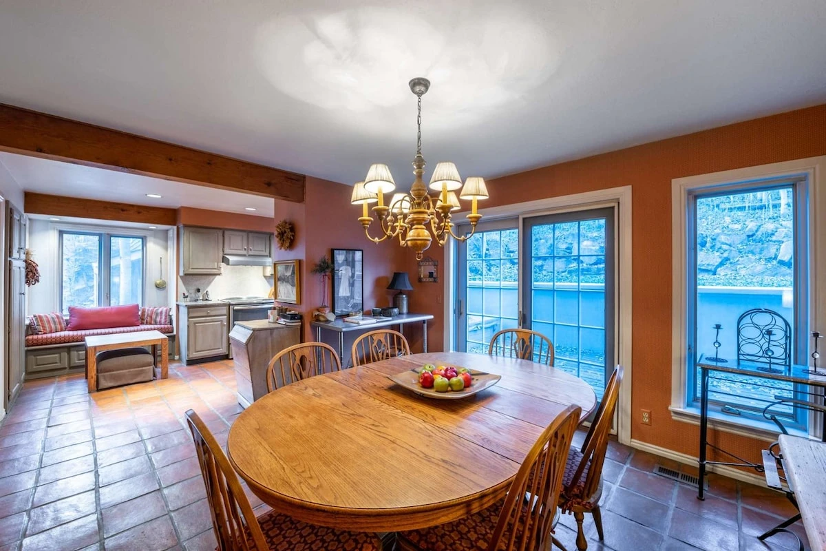 Open Floor Plan - Dining Area is Located Just off The Kitchen and Offers Comfortable Seating For 7 Guests, Oval Dining Table, Terracotta Tile Floors