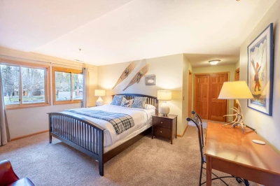 The primary suite is filled with natural light! Guests will find a King bed with a high end mattress, and it features full sized closets.