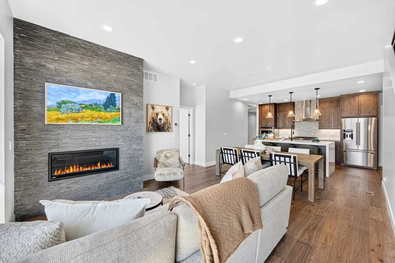 Open floor plan connects the kitchen, dining, and living areas