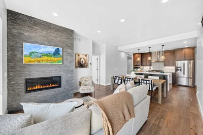 Open floor plan connects the kitchen, dining, and living areas