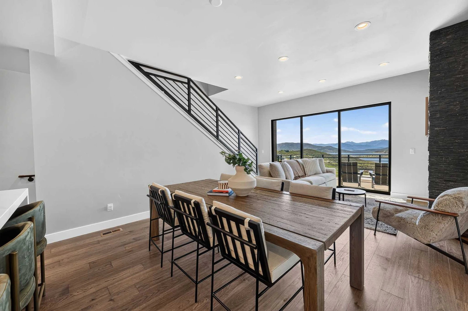 Dining table seats 6, steps from the kitchen and the view